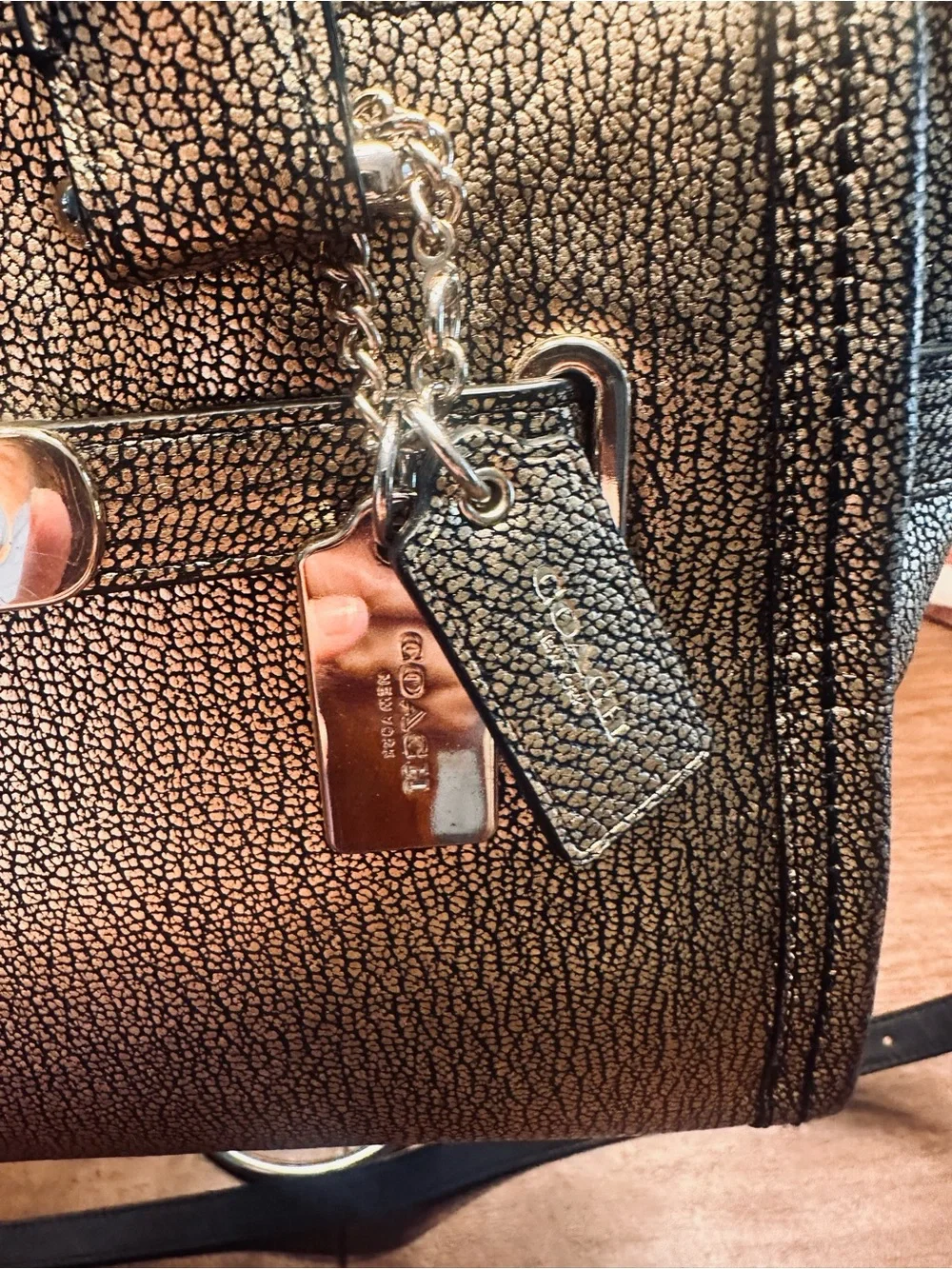 Coach Swagger 27 in Metallic Bronze Pebble Leather with Gunmetal Hardware